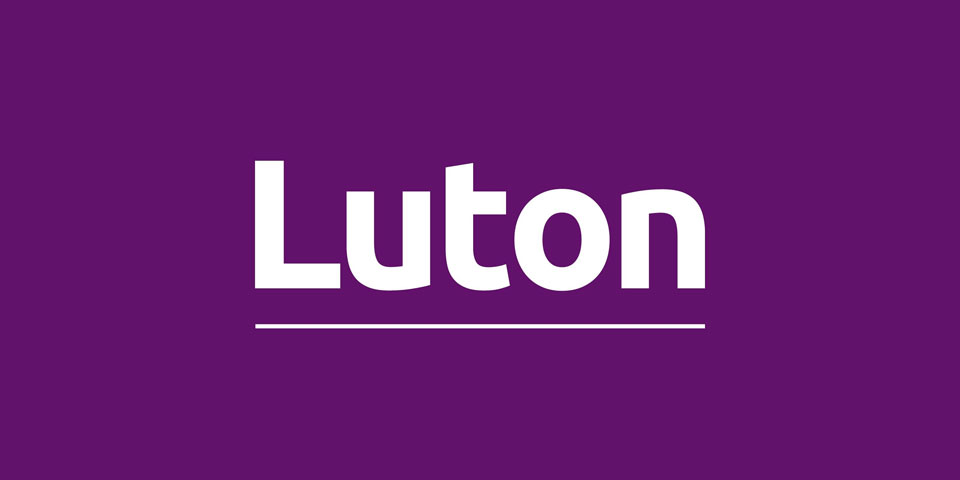White Luton Borough Council logo on purple background